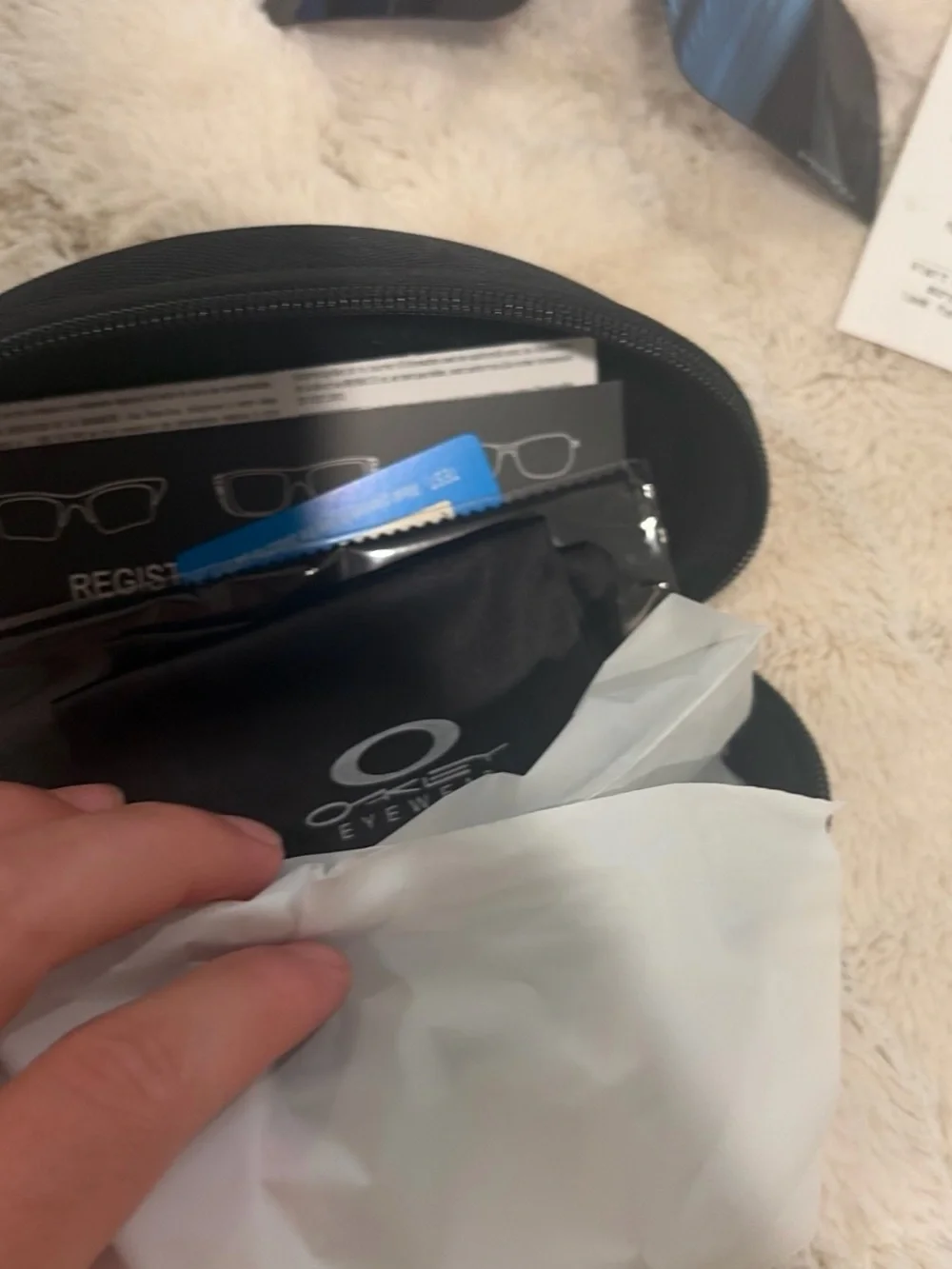 Oakley Sutro white and blue glasses with additional clear and black frames